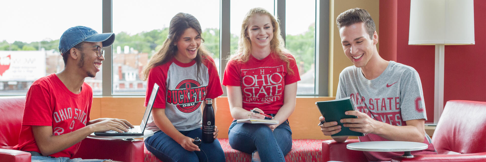 Students gather in a cozy campus lounge to collaborate and create together.