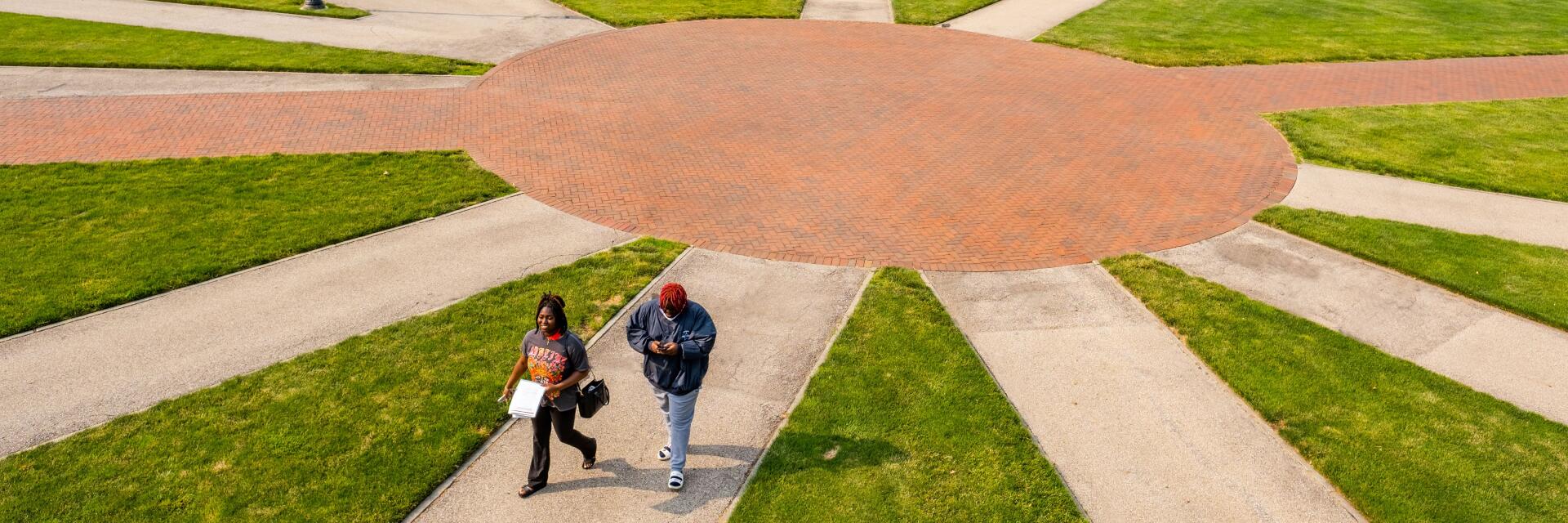 Students walking on the Oval on Ohio State's campus