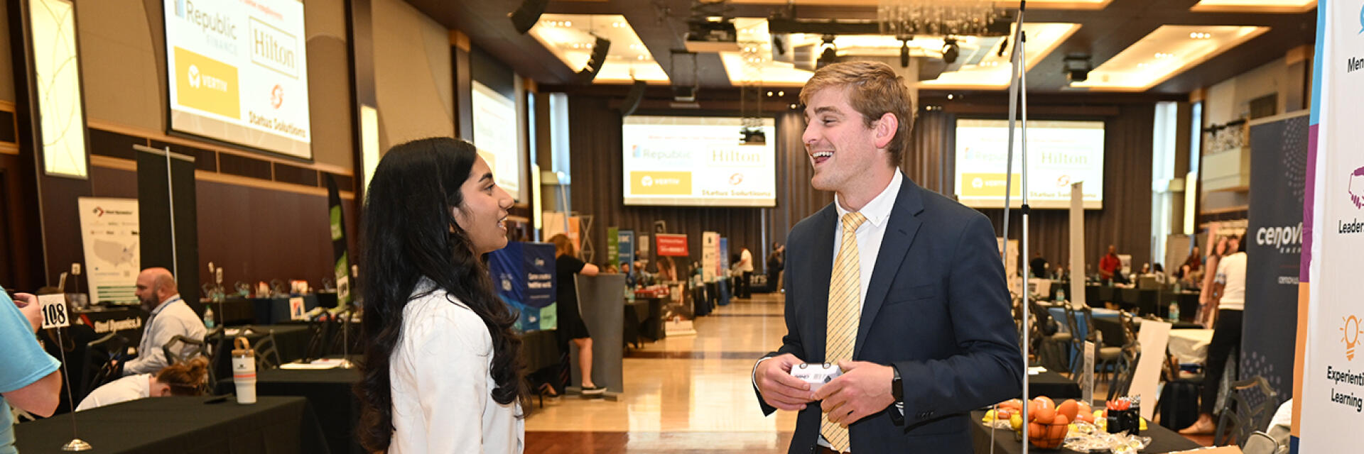 Student and employer engaging during The Ohio State University Career and Internship Fair