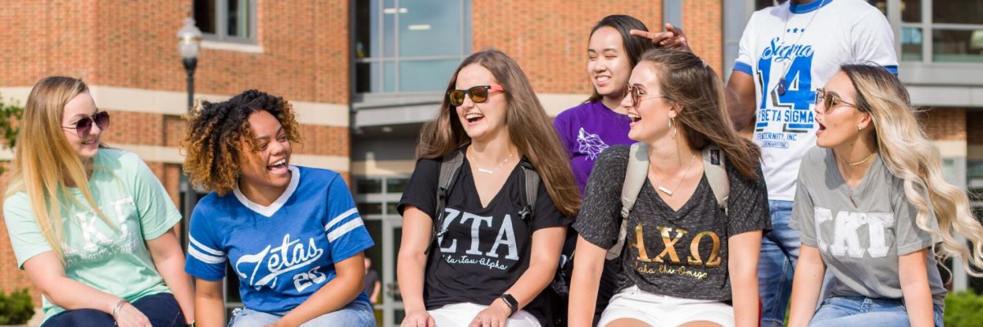 Students sitting outside the Ohio Union